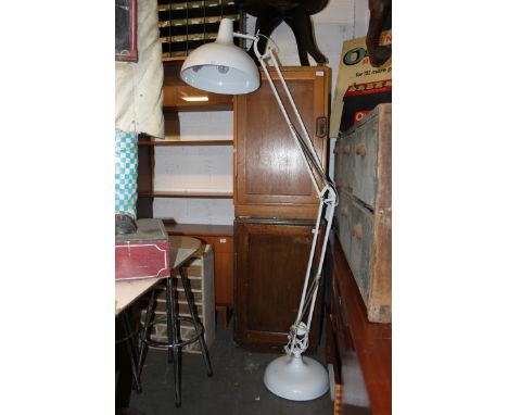 A contemporary full size floor standing anglepoise lamp in white ( size of a standard lamp ) with terraced base and large sha