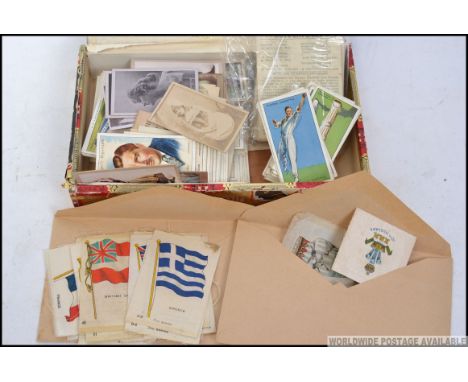 A collection of vintage cigarette cards dating from the early part of the 20th century to include Kensitas silks, Gallagher, 