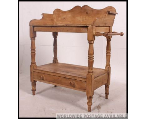 A Victorian country pine washstand table - side hall table. Raised on turned legs with ceramic bowl to centre having a splaye