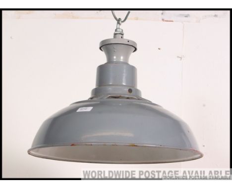 A Retro 1950's Saaflux Industrial factory enamel painted metal pendant light lamp having original grey finish. H40 x W46cm 