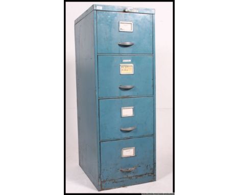 A set of four drawer vintage industrial metal filing cabinet, painted blue with chrome handles, taken from ex Douglas motorcy