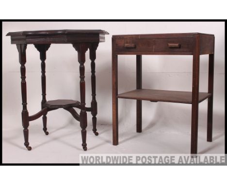 A Victorian mahogany lamp table raised on turned legs with shaped top together with a 1930's oak side table