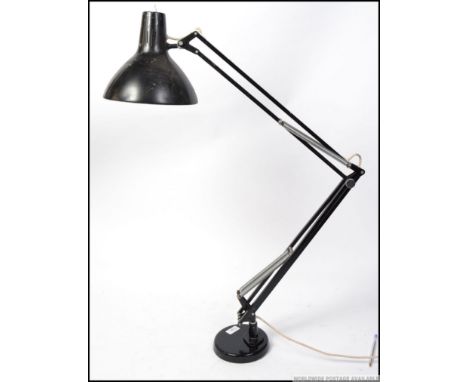 A retro anglepoise / Herbert Terry style lamp, having a pendant shade  and stamped for One Thousand and One Lamps finished in