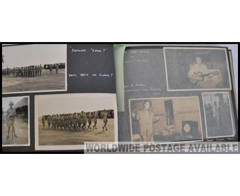 A photo album with highly decorative inlaid cover inscribed MALAYA with images of 1950s British Army Serviceman's time in Por