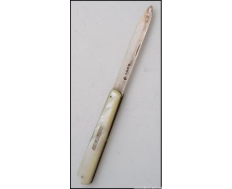 A silver and mother of pearl hallmarked pen knife. Of good size the blade marked for Richard Martin & Ebenezer Hall -Martin, 