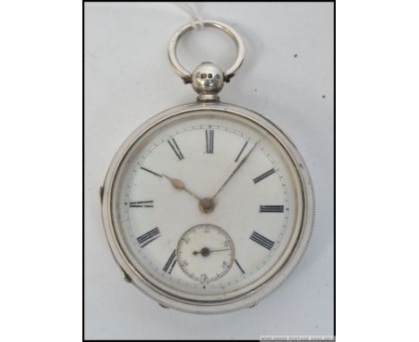 A Victorian silver hallmarked gentlemans pocket watch having enamel face with subsiduary seconds dials. Birmingham hallmarks 