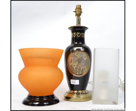 Two 20th Century lamps to include a 24ct gold trimmed lamp and a glass rectangular form lamp along with a retro style orange 