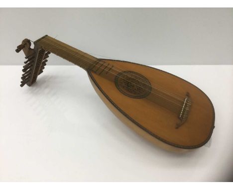 Fine quality hand made lute, typical barrel back form, approximately 90cm long, condition generally good, minor wear