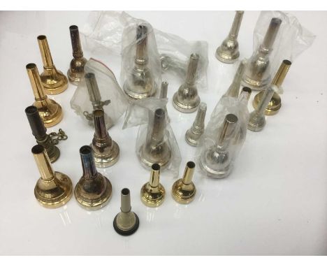Group of various brass instrument mouthpieces, bugle, cornet, French horn, euphonium, tuba etc, including Besson, Denis Wick,