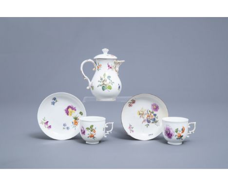 Full title: A German Meissen porcelain jug and cover and two cups and saucers with floral design, 19th/20th C.Description: H 