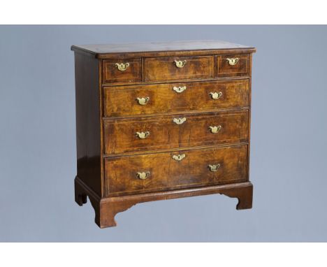 Full title: An English George I walnut chest with three short and three long graduated drawers, first half of the 18th C.Desc