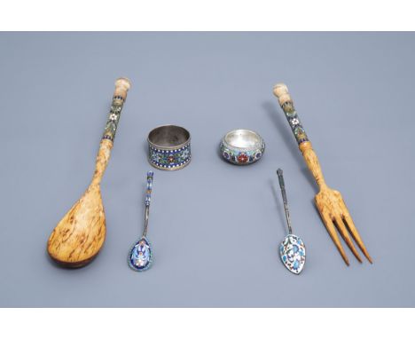 Full title: A varied collection of enamelled Russian silver (a.o. Sasikov), 20th C.Description: L 25 - 10,8 cm (the longest a