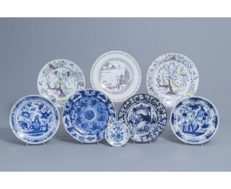 Full title: Eight various Dutch Delft blue, white, polychrome and manganese chargers, 17th C. and laterDescription: Dia.: 35,