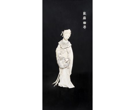 Full title: A Chinese ivory carving of a lady with a fan mounted on a plaque, first half of the 20th C.Description: The carvi