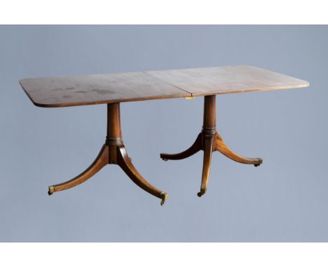 Full title: An English George III mahogany twin pedestal dining table, first quarter of the 19th C.Description: H 75 - L 188 