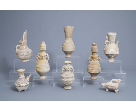 Full title: Eight various unglazed pottery urns and ewers, a.o. Thai, 14th C. and laterDescription: H 34 - 11,8 cm (the talle