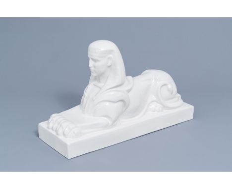 Full title: A large white glazed Maastricht earthenware figure of a sphinx, Petrus Regout, first half 20th C.Description: H 3