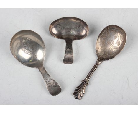 A George III silver caddy spoon, the oval bowl and handle with engraved decoration, Birmingham 1807 by Cocks &amp; Bettridge,