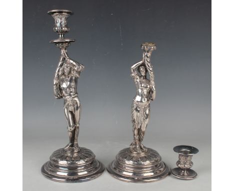 A pair of early 20th century WMF plated figural candlesticks, each modelled as a lady or gentleman holding a cornucopia aloft