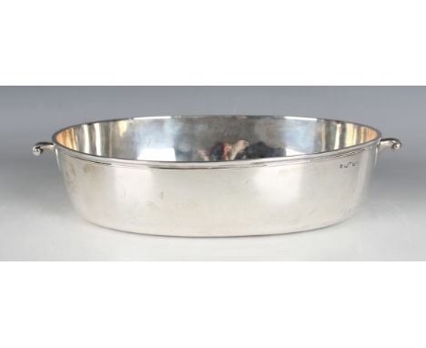 A George III silver oval bowl with scroll handles and reeded rim, London 1807 by Robert Garrard I, weight 684g, length 29.5cm