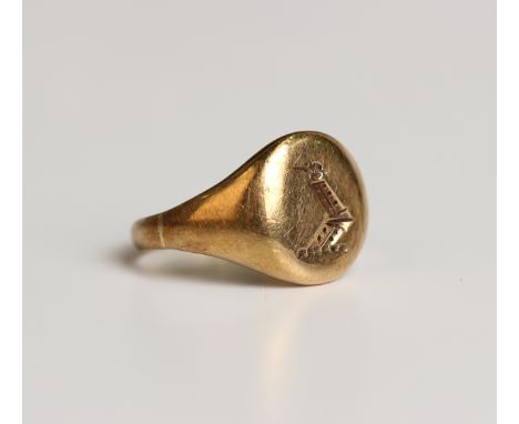 A gold oval signet ring, crest seal engraved, unmarked, weight 5.8g, ring size approx M1/2, and one base metal dress stud.Buy