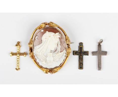 A gold pendant cross, unmarked, weight 5.5g, length 4.5cm, a silver pendant cross, Chester 1907, a base metal pendant crucifi
