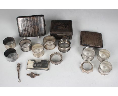 A small group of silver items, including two pairs of napkin rings, Birmingham 1903 and Sheffield 1932, a child's buttonhook 