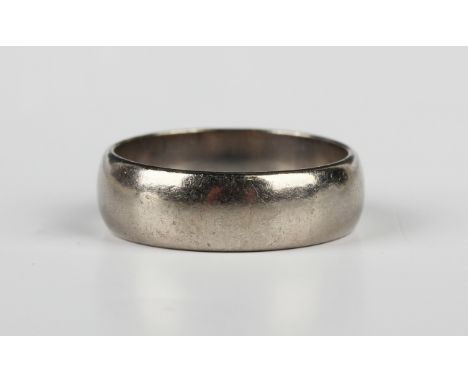 An 18ct white gold wedding ring, London 1963, weight 5.7g, ring size approx M.Buyer’s Premium 29.4% (including VAT @ 20%) of 