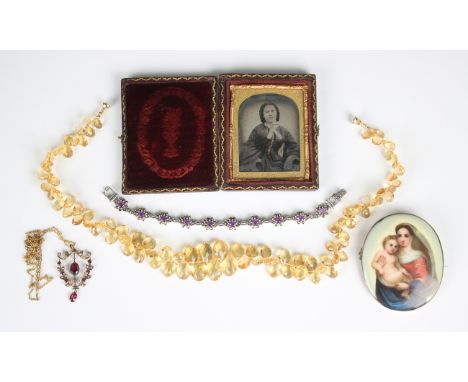 A gold, garnet and seed pearl pendant, detailed '9ct', weight 2.2g, length 4cm, with a gilt neckchain, a citrine necklace, fo
