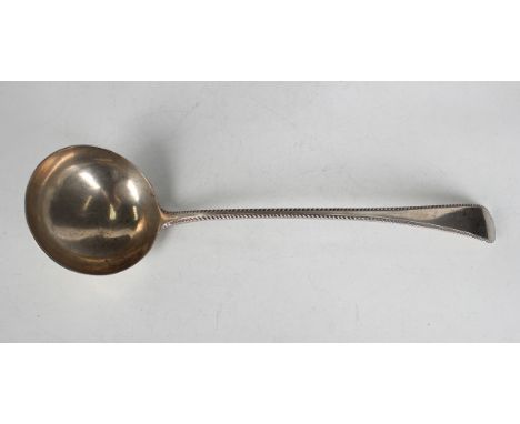 An Edwardian silver Old English Feather Edge pattern soup ladle, London 1903, indistinct maker's mark, weight 187.9g, length 