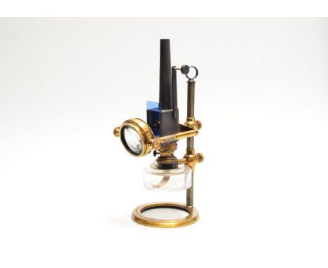 A early 20th Century lacquered brass Microscope Lamp,  with screw-clamp adjustment, spirit lamp with glass reservoir, blue gl