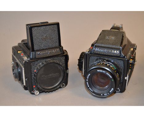 Two Mamiya 645 1000s Medium Format Camera bodies, one with pentaprism, shutter unreliable, body F, other body, shutter workin