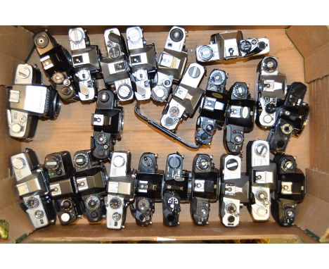 A Quantity of Manual Focus SLR Bodies, incl; Canon FTb, Minolta SRT101, Nikon EM, Olympus OM-1 and more 