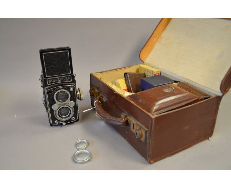 A Rolleiflex Automat TLR Camera, with Carl Zeiss 7.5cm f/3.5 lens, shutter working, body F-G, elements F, filters, other acce