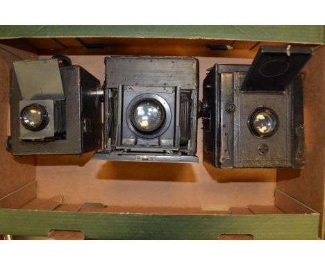 Three Graflex Cameras, including; Thorton Pickard Special Ruby Reflex with T,T & H 5-1/4'' f/4.5 lens, Compact Graflex with B