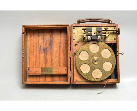 A Shortt Speed Recorder,  lacquered brass, with paper roll and solenoids, stamped The Shortt Speed Recorder, Chronograph Sect