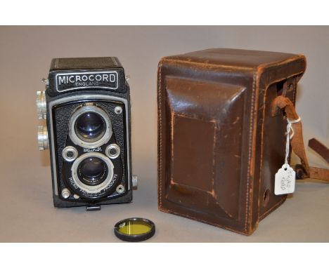 A Microcord I TLR Camera, with Ross Xpres 77.5mm f/3.5 lens, shutter working, body G, elements G, in leather case 