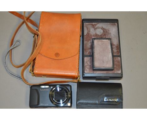 A Lumix DMC-TZ40 Digital Camera, untested, body VG and a Polaroid SX-70 Land Camera AF 