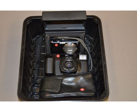 Leica Compact Cameras, A leica AF-CI 35mm camera and a Leica C-Lux-I compact digital 