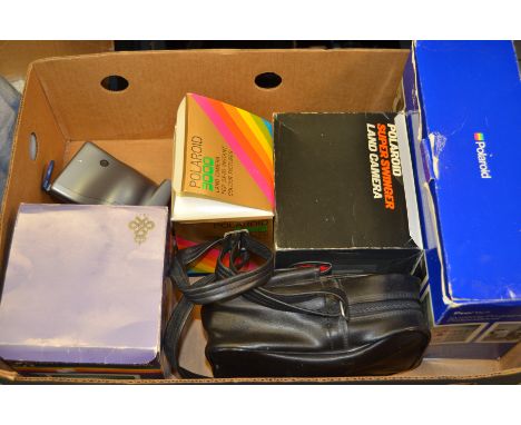 A Tray of Polaroid Cameras and Boxes, incl; Polaroid Super Swinger Land Camera, Polaroid 3000, Polaroid Joycam and more 