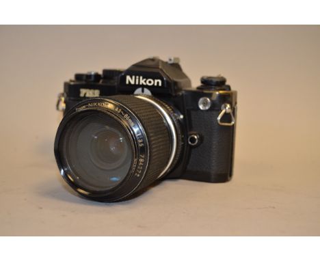 Nikon FM2 35mm SLR Camera, with zoom Nikkor 43-86mm f/3.5 lens, brassing to body, elements G, untested 