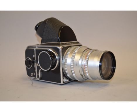 A Hasselblad 500C Medium Format SLR Camera, with Sonnar 150mm f/4 lens, shutter working, body VG, elements G 