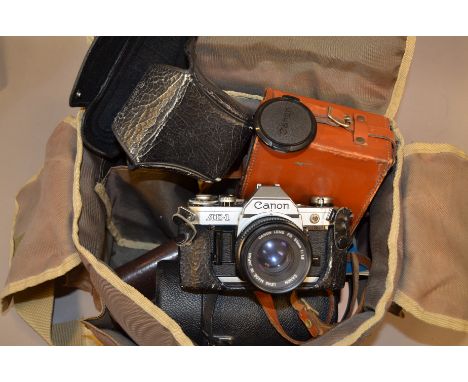 Canon AE-I 35mm SLR Camera, winder stuck,  with 50mm f/1.8 lens, Vivitar 75-205mm f/3.8 lens body F, elements G, lens hood an