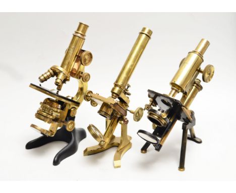 Brass Compound Monocular Microscopes,Swift with mechanical stage and tripod base and Leitz with triple nosepiece and horsesho