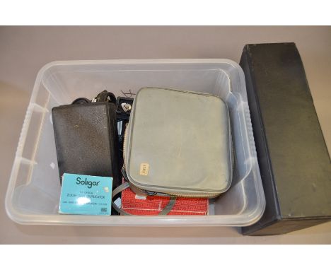 A Box of Camera Accessories, incl; Cokin branded case with filters, lens hoods slide projector equipment and other items  