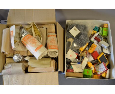 A Box of Camera Accessories, incl; film stock, filters, tubes, lens caps, and a box of photo flash bulbs 