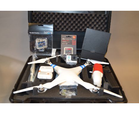 A Phantom 2 Drone, in outdoor case, with batteries, remote control unit, Go-Pro Hero 3+ camera, Giga T Pro II wireless timer 
