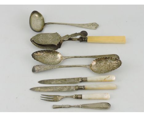 A pair of Georgian silver fruit servers, London 1808, with later floral and foliate engraving and repoussé, 4ozt; together wi