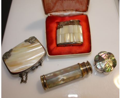 A small collection of mother of pearl items, to include a pill box, small purse, lighter, etc.