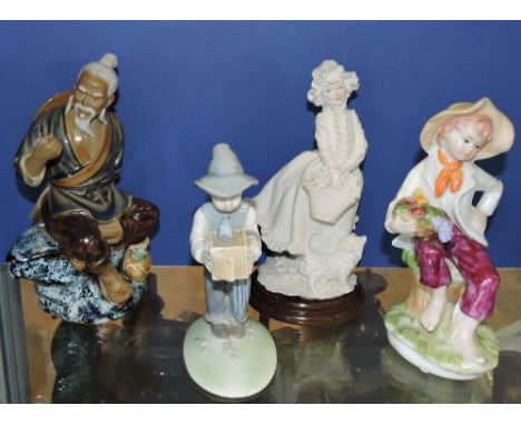 A Tang style figure, Seated Fisherman, H. 15cm; together with three other ceramic figures. (4)